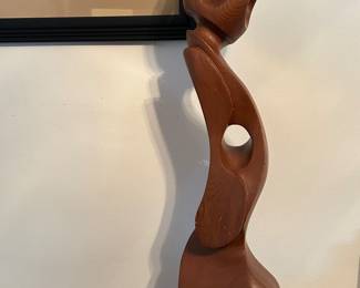 N. Bernstein carved teak statue.