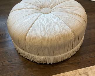 Round ottoman with fringe 