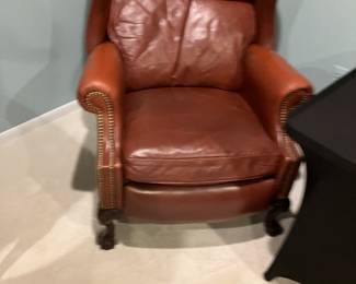 Two leather  recliners  wing back chairs 