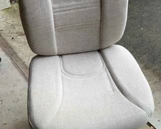 Cream Colored Chair On Casters