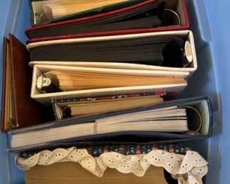 A Bin Of Empty Photo Albums 