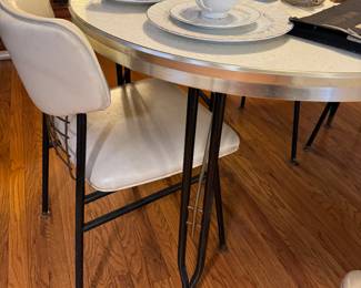 MCM retro chairs, and Mika table