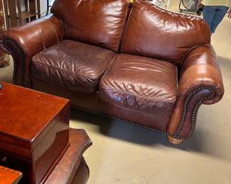 Leather love seat, part of 3 piece set, with two matching sofas