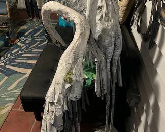 Two artist cranes sculptures