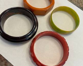 Bakelite bangle bracelets, plus jade bracelet