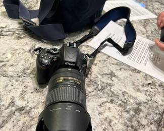 Commercial Nikon camera with many Lense