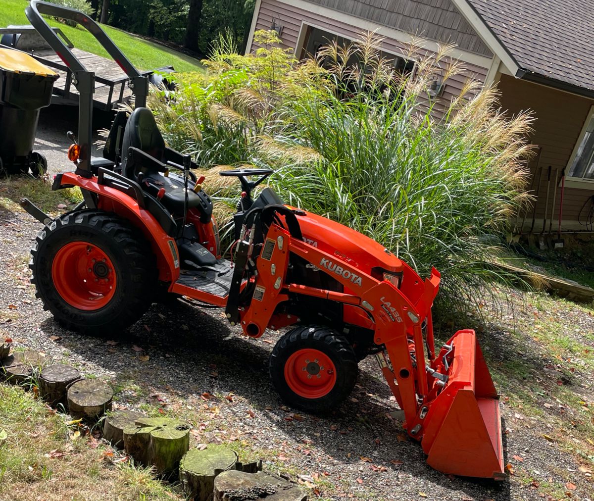 2022 Kubota B2301 utility tractor with LA435 loader attachment, 6' brush hog, and 6' custom snow plow *BID ITEM*