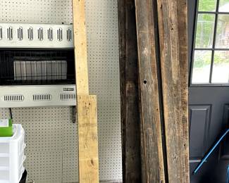 Barn wood. One of 2 wall mounted heaters by Glo-Warm.