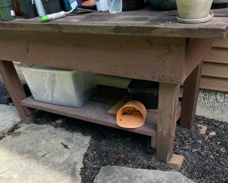 One of a few potting benches/primitive tables