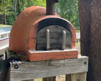 Pizza oven. Barn wood table.
