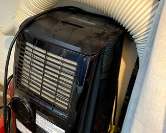 Portable air conditioner on wheels