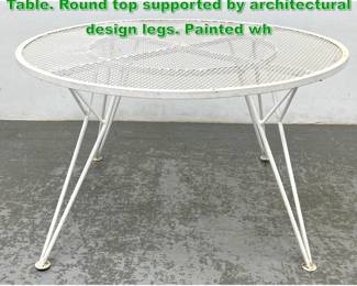 Lot 1331 Salterini style MCM Iron Outdoor Table. Round top supported by architectural design legs. Painted wh