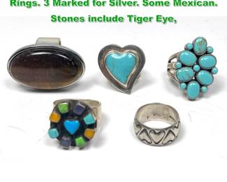 Lot 1479 Collection 5 Silver or Sterling Rings. 3 Marked for Silver. Some Mexican. Stones include Tiger Eye, 