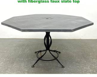 Lot 1385 Woodard Sculptura dining table with fiberglass faux slate top