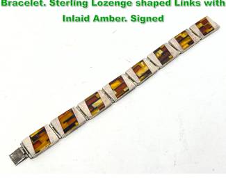 Lot 1448 Sterling Silver Inlaid Amber Link Bracelet. Sterling Lozenge shaped Links with Inlaid Amber. Signed 