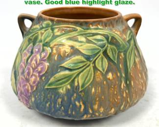Lot 1664 Vintage Roseville Wisteria Handle vase. Good blue highlight glaze. 