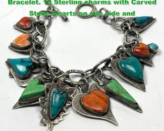Lot 1511 Silver Southwest Artisan Charm Bracelet. 10 Sterling charms with Carved Stone Hearts on one side and