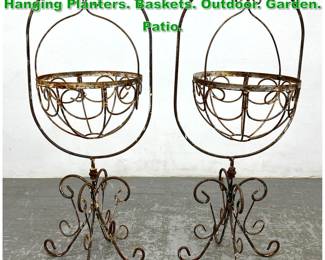 Lot 1339 Pr Iron Decorative Stands and Hanging Planters. Baskets. Outdoor. Garden. Patio.