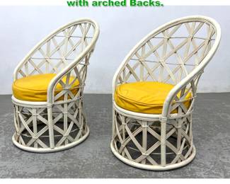 Lot 1395 Pair Rattan Framed Lounge Chairs with arched Backs. 