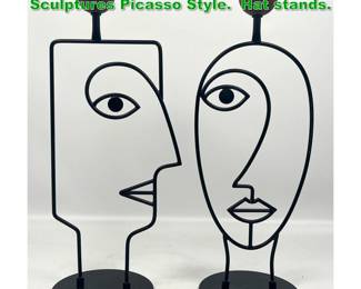 Lot 1319 Modernist Man and or Woman Head Sculptures Picasso Style. Hat stands. 