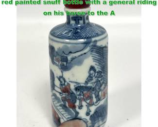 Lot 1581 Porcelain under glazed blue and red painted snuff bottle with a general riding on his horse to the A