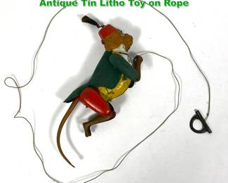 Lot 1695 LEHMAN TOY Climbing Monkey Toy. Antique Tin Litho Toy on Rope