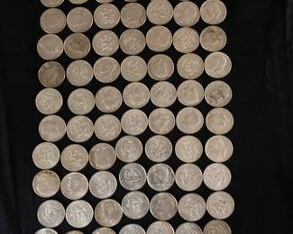 90 1964 Kennedy 1/2 dollars. These were purchased new in rolls, then opened and kept in a butter dish. Never circulated but still touched