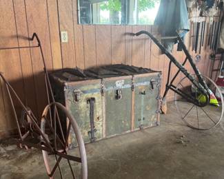 Old plow and trunk
