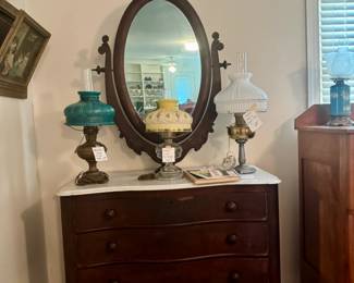 Oval mirror dresser and lamps