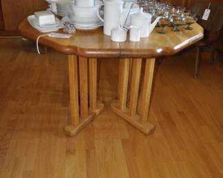 Vintage Walter of Wabash octagonal dining table with one leaf and a Rosenthal China service for 12 along with Russell Wright glassware
