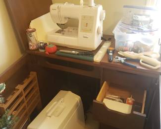 Sewing machine and cabinet