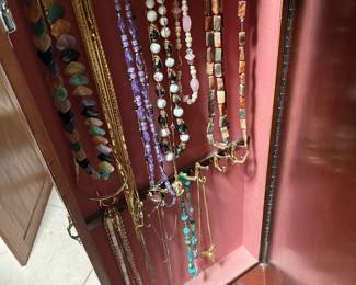 Partial look at women's costume jewelry