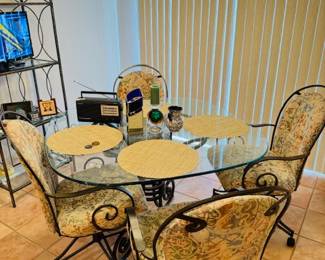 Vintage Wrought Iron & glass top Breakfast table (Chairs have wheels)