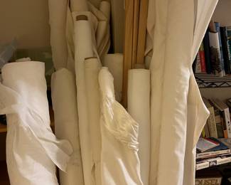 Bolts of fabric, some canvas.
