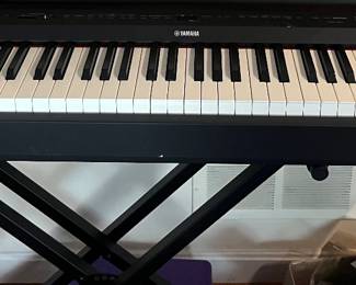 Yamaha electric piano and stand. 
