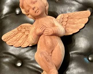 Carved wooden angel figure