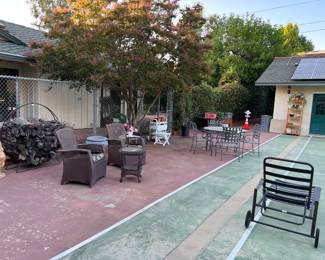 Two patio furniture sets are here, along with the chaise lounger (though it needs a cushion).