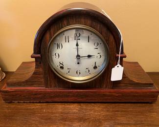 This mantle clock is by Seth Thomas.