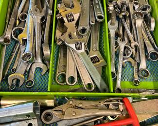 That is a lot of monkey wrenches in the middle drawer.  I can understand having a couple sets of box-end wrenches, though.