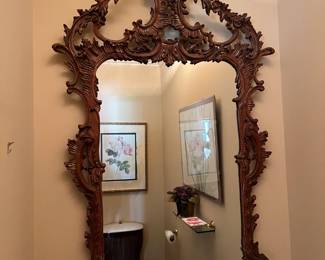 Here you can see the very ornate hanging wall mirror.