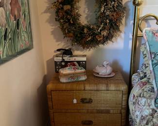 There are a pair of nightstands that could be yours.  And who could ignore that wreath?