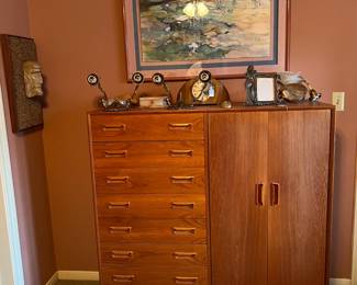 This is another Danish Modern piece you won't want to miss.  Oh, and there are a pair of wall-mounted lamps that from this angle look like alien eyes on stalks (they're just sconce lamps without light bulbs laid down on their backs).