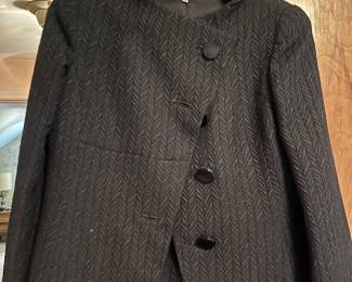 A collection of ladies fashion, including Armani, Escada, and other fine makes mostly medium to large.