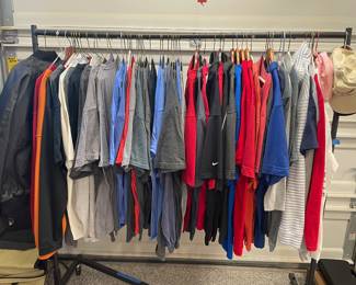 Entire rack is Corvette branded t-shirts, collared shirts, sweatshirts, jackets and hats. 