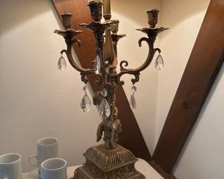 brass provincial lamp with cherub