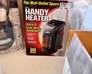 New - Handy Heater - wall-outlet space heater 