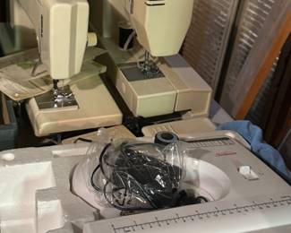Vintage Sewing Machines, New in the box Surgers