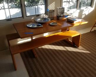 Fabulous artisan crafted wood trestle table with two bench seats. Made by Brandywine Furniture Inc. of Lenni, PA