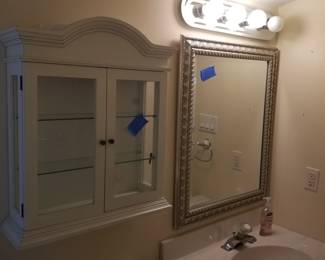 Bathroom cabinet; mirror; vanity lights