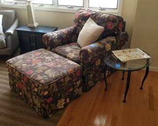 Floral print arm chair with matching ottoman; glass & metal end tables - two available